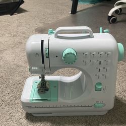 Kids blue sewing machine