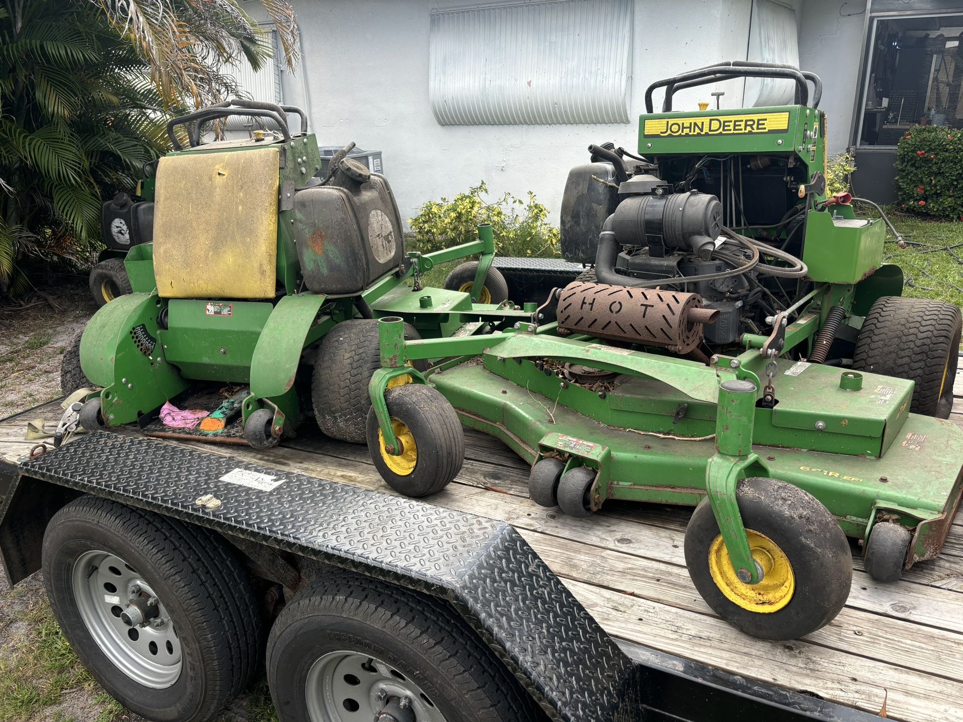 2 John Deere Stand Up Mowers