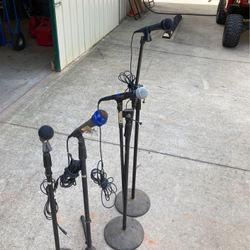 4 Microphones And Stands 