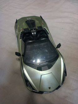 A 1:12 Scale Radio - Controlled Lamborghini Sian Roadster.
