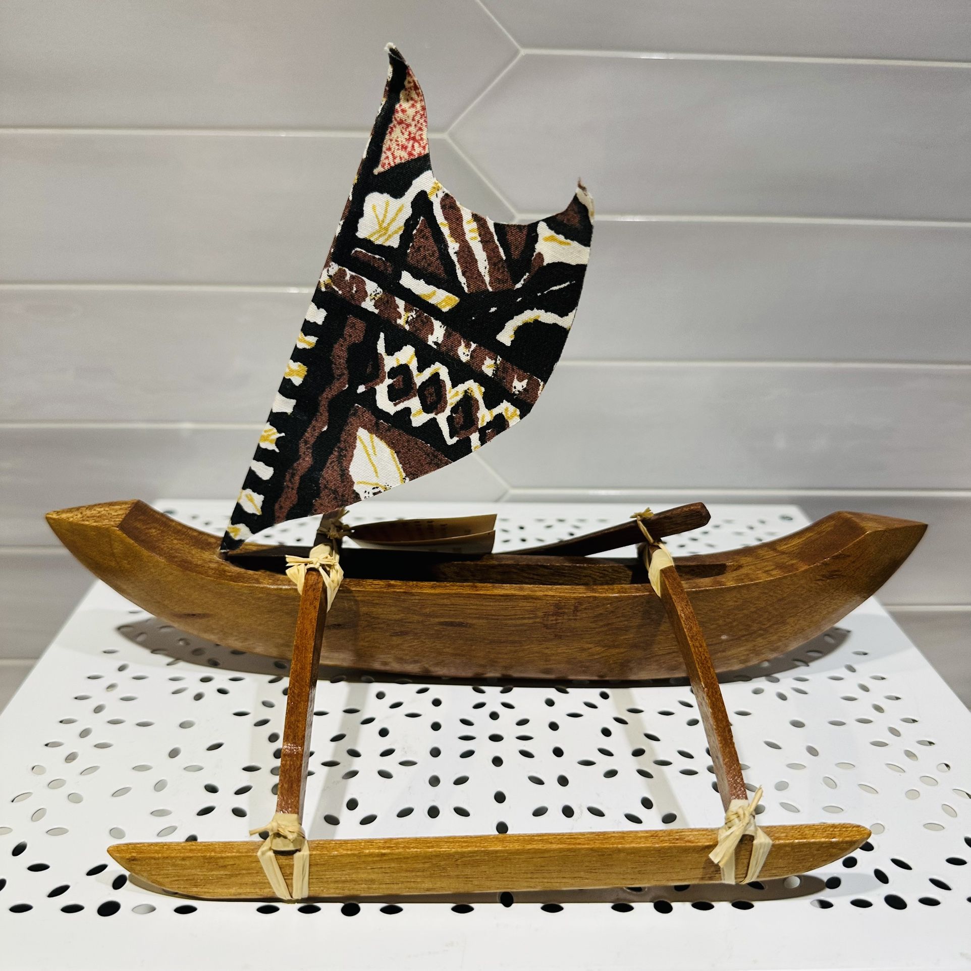 Vintage 70s Hawaiian solid carved Koa wood outrigger canoe. Tapa bark cloth sail 11 1/2” long x 5” wide x 8” tall  