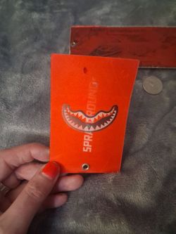 Sprayground Orange Hang Tag