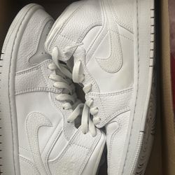 All white Air Jordan Mids 