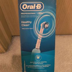 New Oral-B Professional Precision 1000 electric toothbrush.