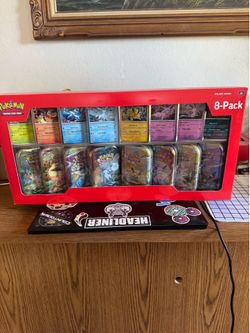 Pokémon Prismatic Evolutions 8-Pack Tin Collection (Costco Exclusive) Unopened