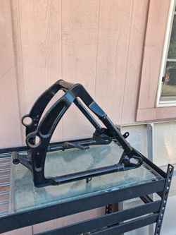 Soft tail swing arm