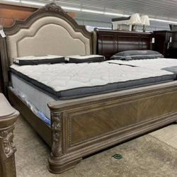 Charmond Brown Sleigh Bedroom Set

includes bed, dresser, mirror, and nightstand