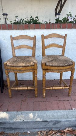 Pair of vintage antique swivel wooden rattan high tools