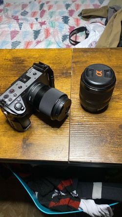 Sony fx30 with sigma 30mm lens and Sony 18-135mm lens