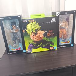 3 Dragon Ball Z figurines.