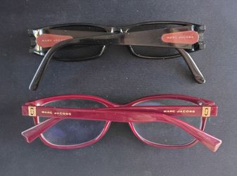 two pairs of Marc Jacobs designer eyewear frames