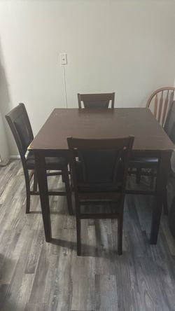 Wood table set with chairs