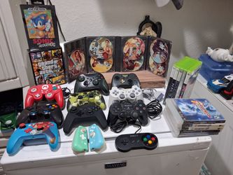 Selling these controllers and video games. Good Condition.  asking 200 for everything. 

-Grand Theft Auto Five "V" for Pc.
- SEGA Genesis SONIC the h