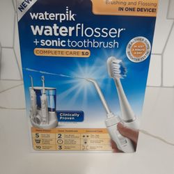 Brand New Waterpik Water Flosser