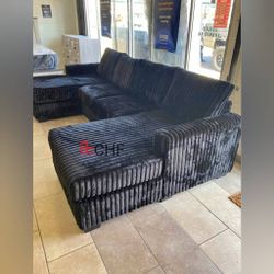 Black jumbo corduroy double sectional sofa
