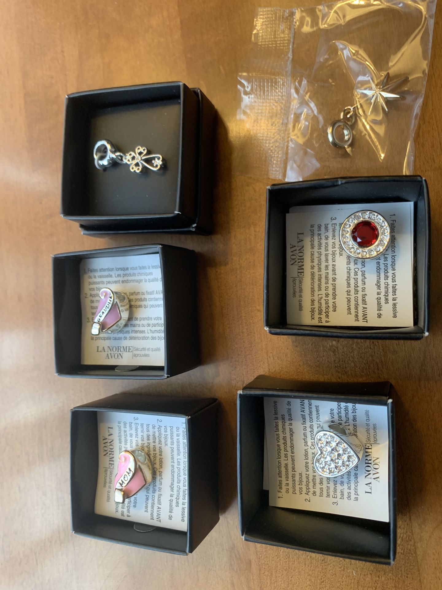 Avon Charms/slides