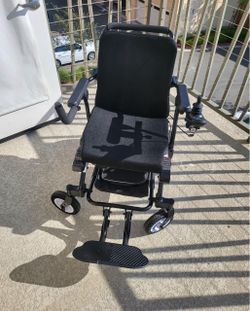 Electric wheelchair for a small car