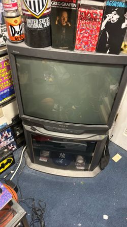 Classic working 28” Sony Tube TV and stand. Works great.