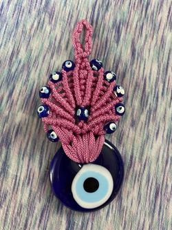 Pink evil eye