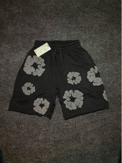 Black denim tear shorts