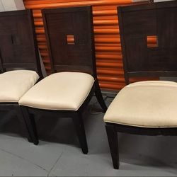 Set Of Six Wooden Chairs with White Cushions