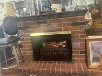 Cozy fireplace tv stand with remote( blows heAt and lights up) holds up to 55”