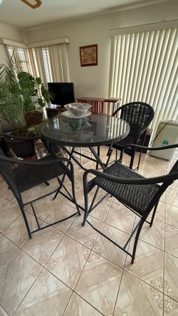 Whicker 4 piece set. High top table with 3 chairs