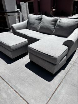 Ashley Sofa and Chair plus 2 Ottoman’s