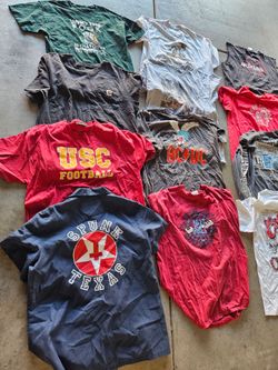 Tons of T shirts, pants etc. some vintage