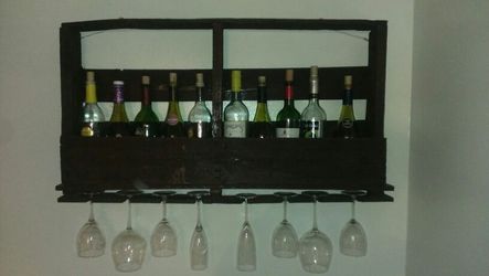 Wine rack with glass holder