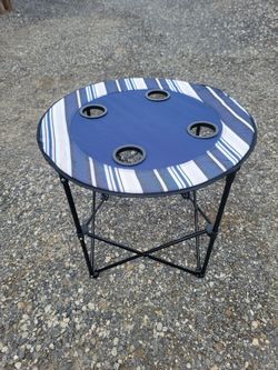 Portable folding camp table