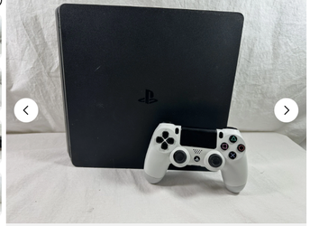 PS4 Slim 1TB Console Bundle - Complete & Ready to Play!