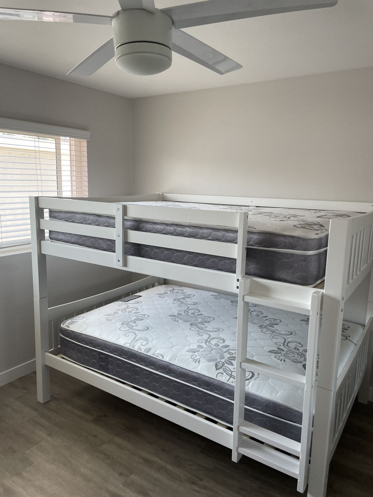 Full over Full bunk bed. Dark walnut,grey & white-$499. Full mattresses -$125.00 each. Assembly not included. Taxes included. Free delivery.  Se habla