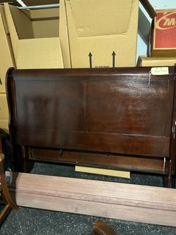 Queen cherry wood headboard,  footboard,  rails,  and night stand