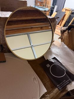 28in round gold framed wall mirror