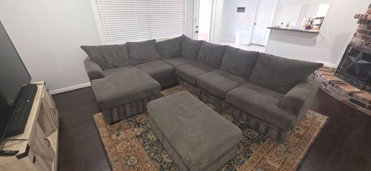 Sectional sofa with storage bin