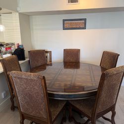 Round dining table with 6 chairs