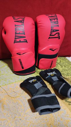 Everlast Elite boxing gloves paired with Everlast EverGel hand wraps (Size Medium).