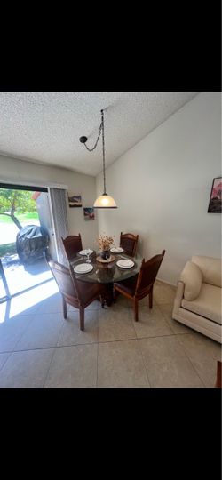 Round Glass Top Dining Table with 4 Chairs