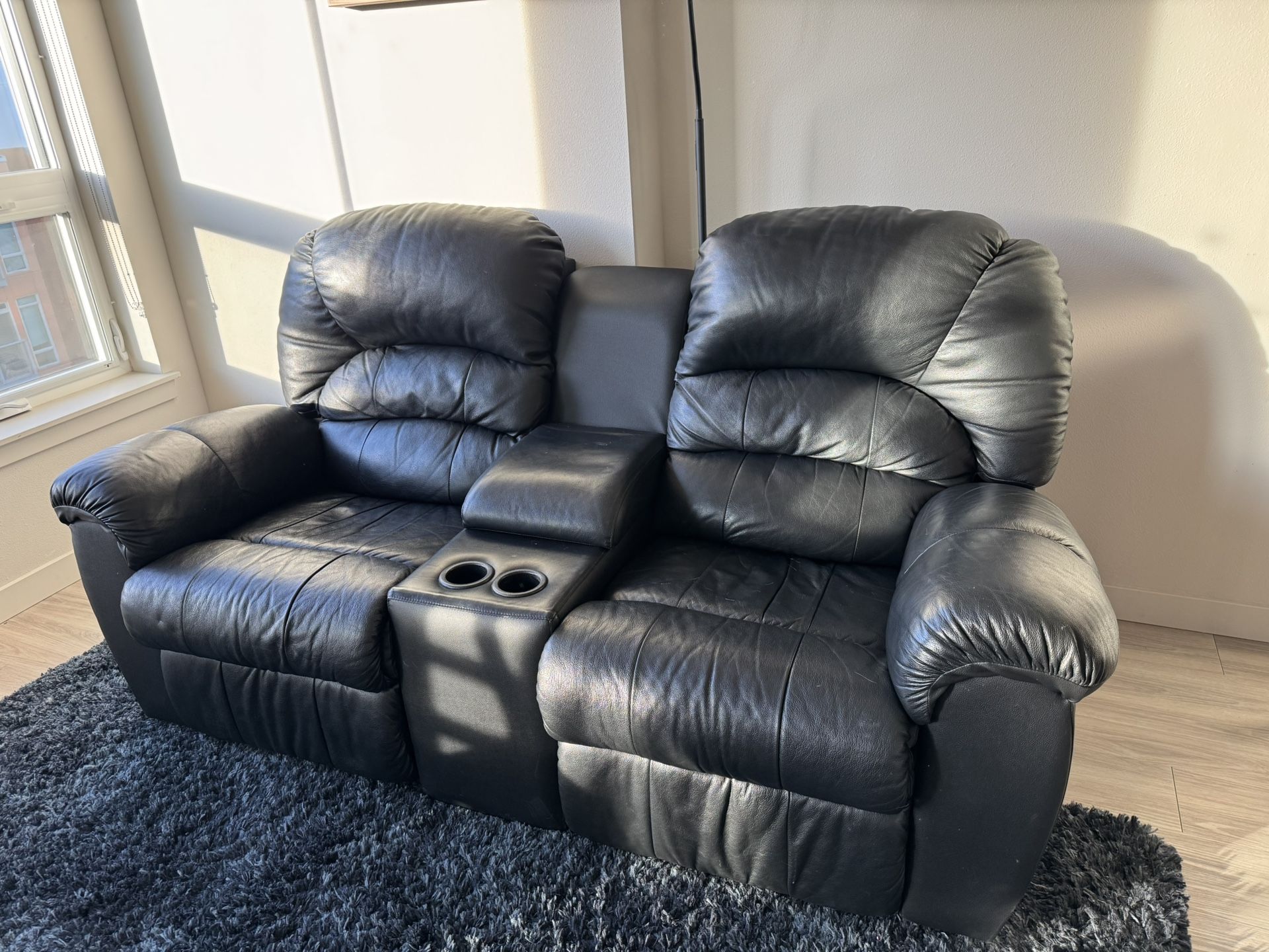 Black Leather Reclining Loveseat