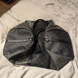 Two tone grey black Louis Vutton duffel bag