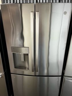 GE FRENCH STYLE STANDARD SIZE REFRIGERATOR STAINLESS STEEL