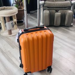 NEW Bright Orange 20” Carry-On Spinner Suitcase w/ Combination Lock – $30  Stand out at the airport with this bold bright orange carry-on suitcase. Br