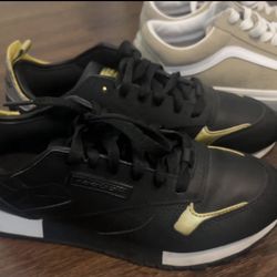 Gold And Black Reeboks