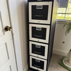 Tall metal filing cabinet