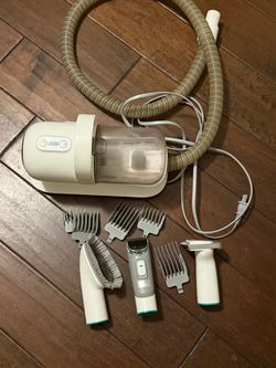 Pet grooming vacuum