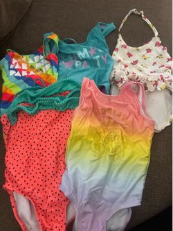 Used swimsuits size 4/5T