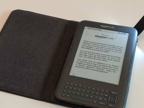 Amazon Kindle Life-Time FREE 3G + Wi-Fi Edition eBook reader with Genuine Leather Case with Light, 4GB, New Battery, Ad Free