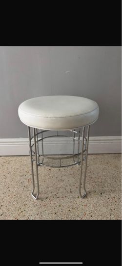 Chrome Vanity Stool with a White Cushion & Mesh Storage Shelf, in good condition. $25 obo
