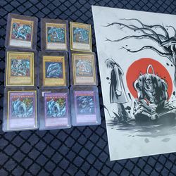 $1200! All you see. 9 Blue eyes 1996 1st Edition & Picture frame with signature just 1 Blue eyes goes $300! To 1000. I have 9  hahaha